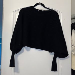 Black off the shoulder sweater with balloon sleeves
